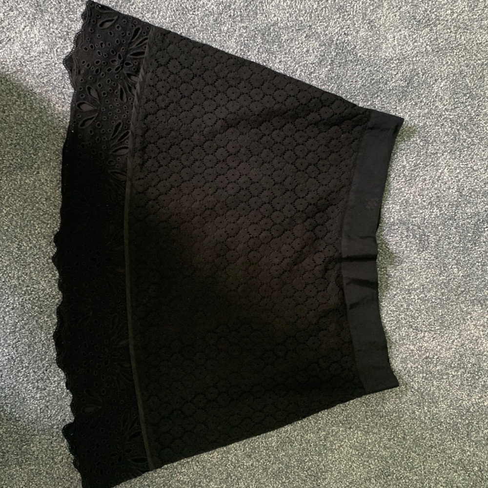 Women’s black eyelet lace skirt. Loft brand. Size 12 petite.
